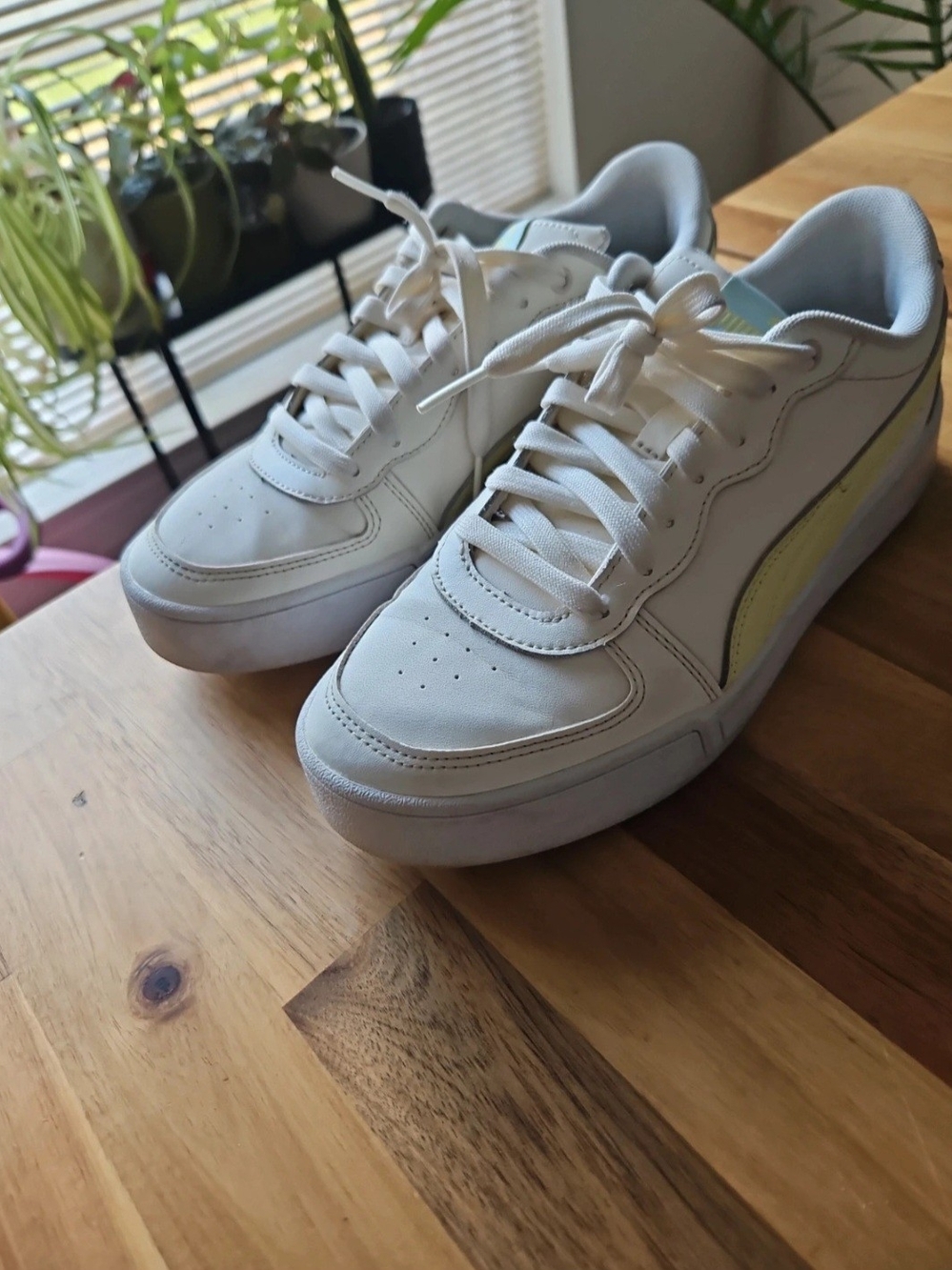 Puma Kids White Sneakers with Pastel Blue and Pale Yellow Accents